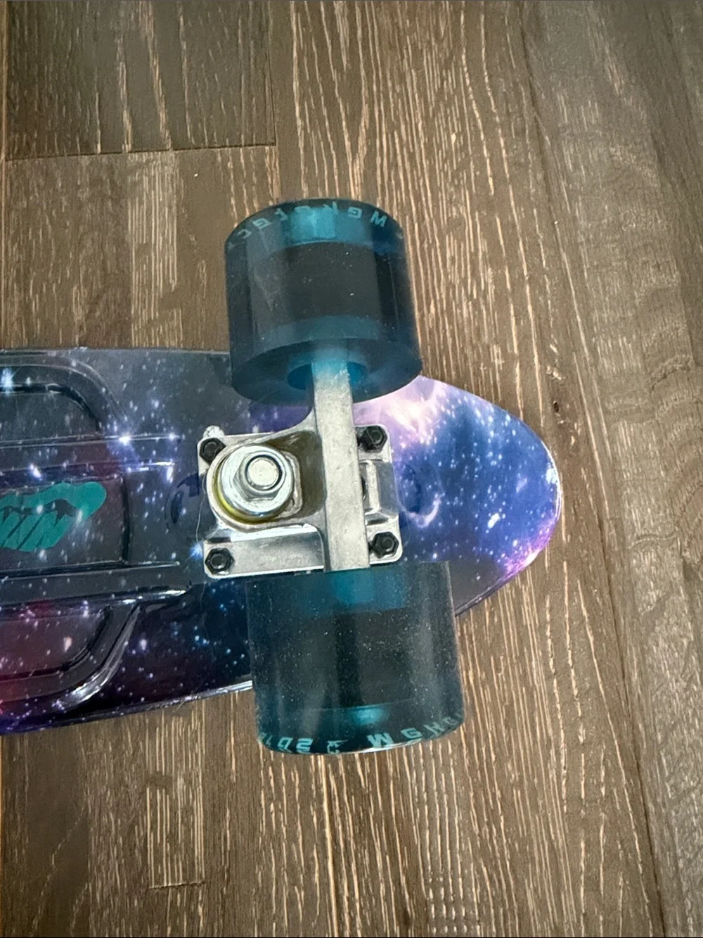 Galaxy Print Skateboard Wall Accent in Purple and Pink